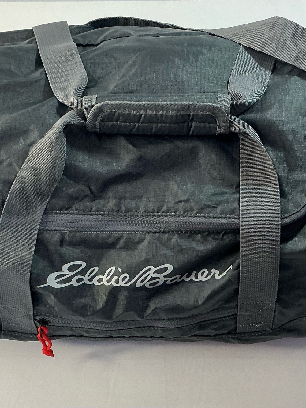 Eddie Bauer Black Duffel with Red Zipper Accent